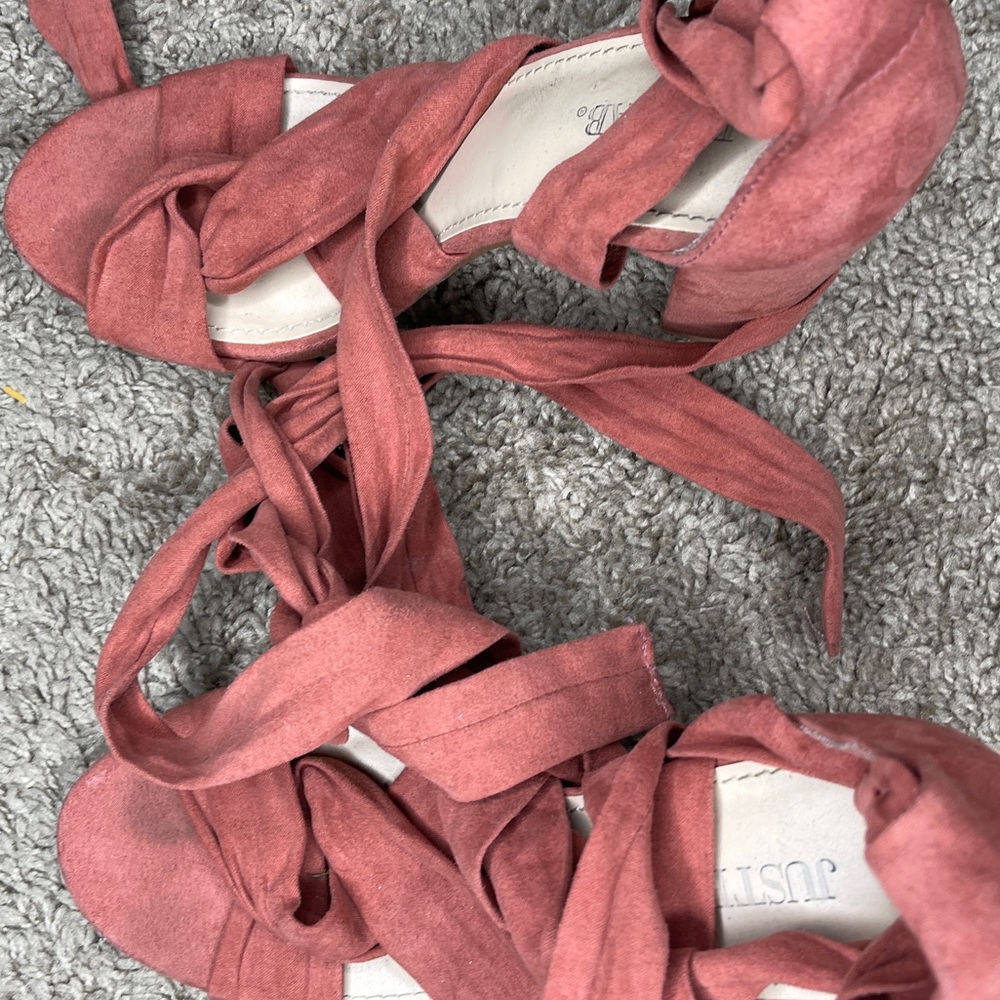 Selling these pink lac up heels. Worn once.